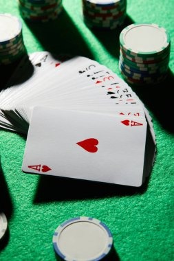 Live-dealer blackjack table rendered on iPhone screen showing dealer video and betting chips